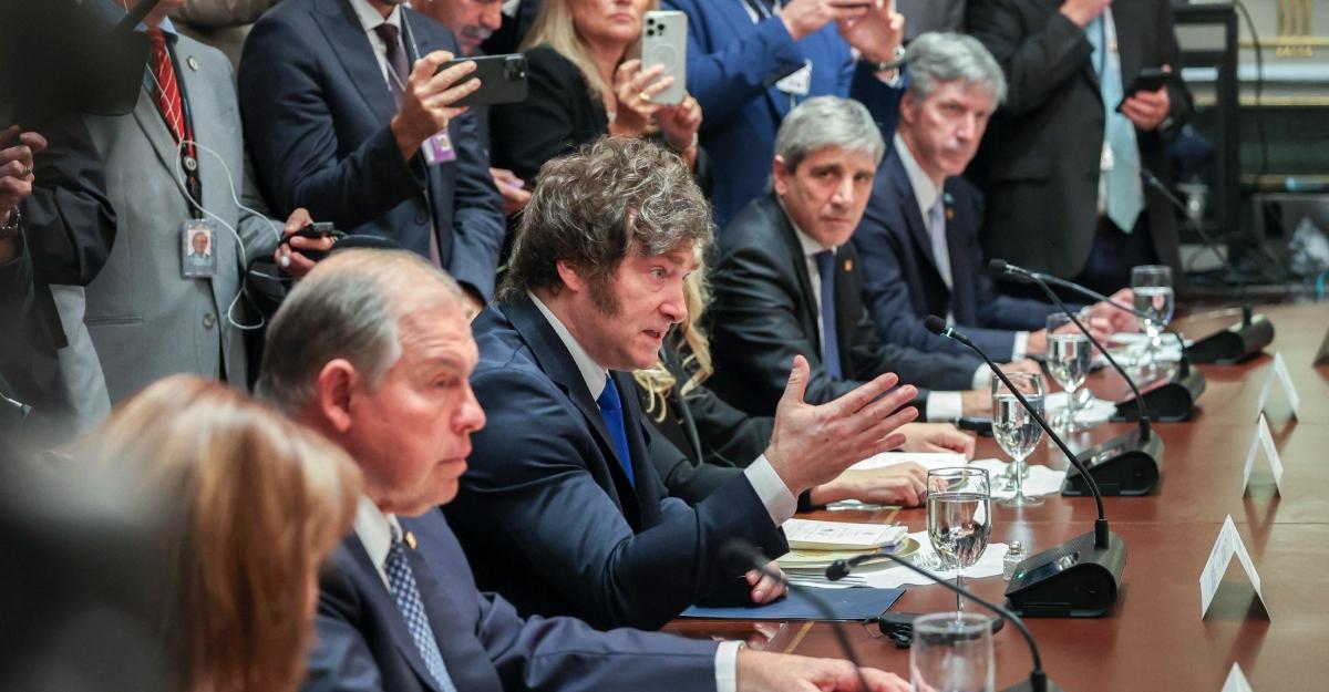 Javier Milei talks during a meeting wih Trump