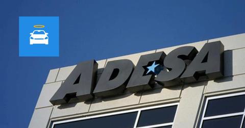 Adesa sign and Carvana logo