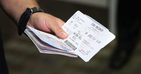 Person holding a passport