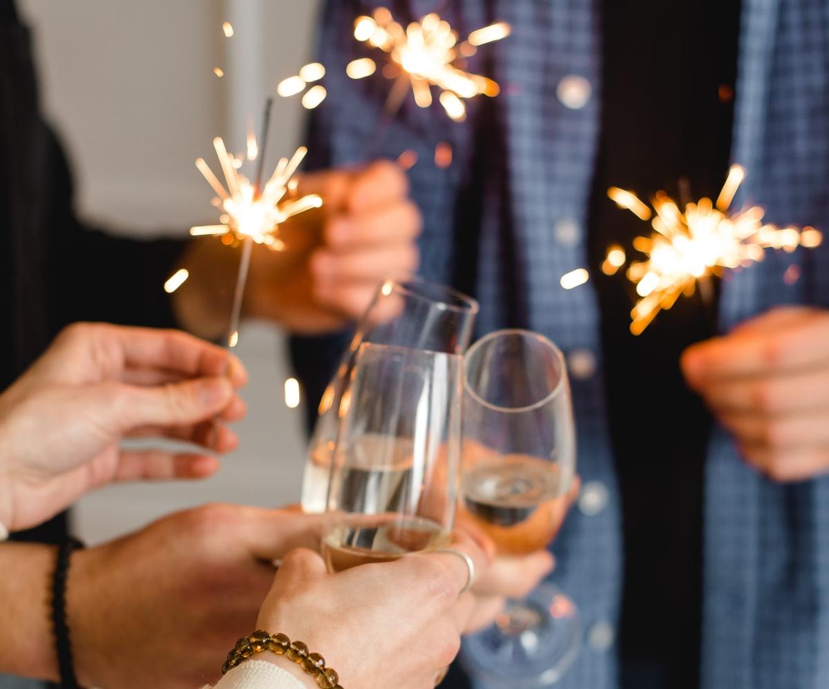 New Year's Eve celebration with champagne and sparklers. 