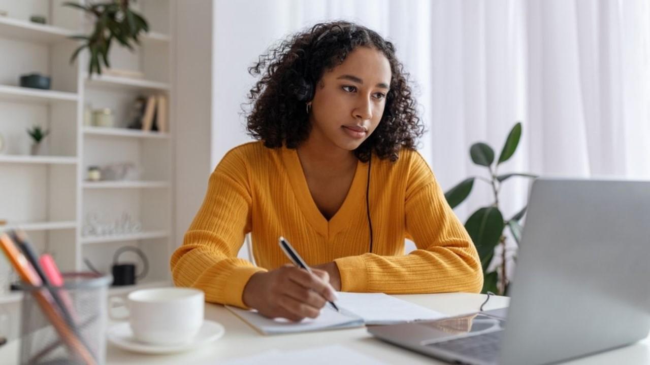 A woman looking at sign-on bonus information