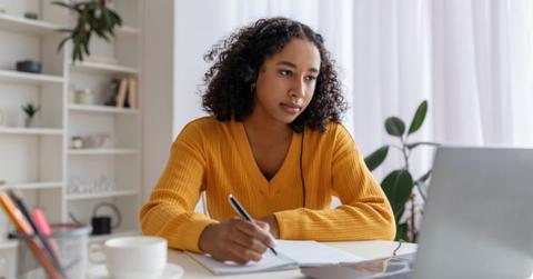 A woman looking at sign-on bonus information
