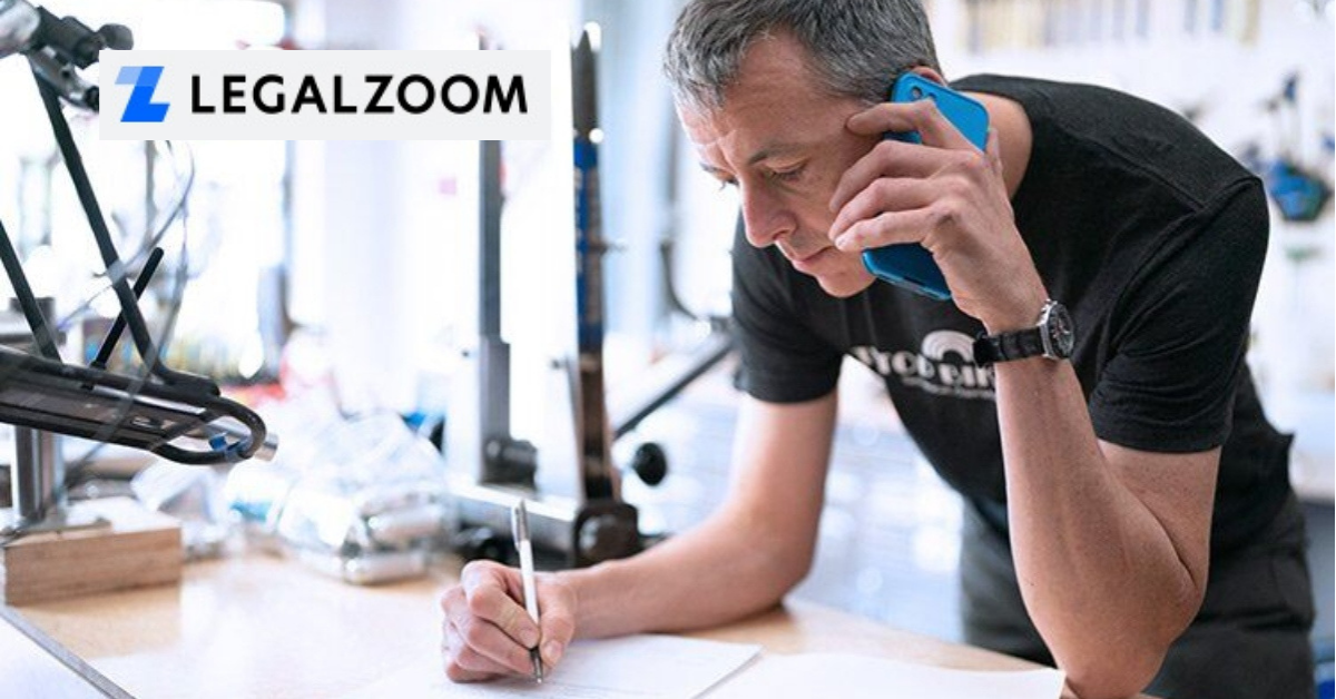 Man taking notes and the LegalZoom logo