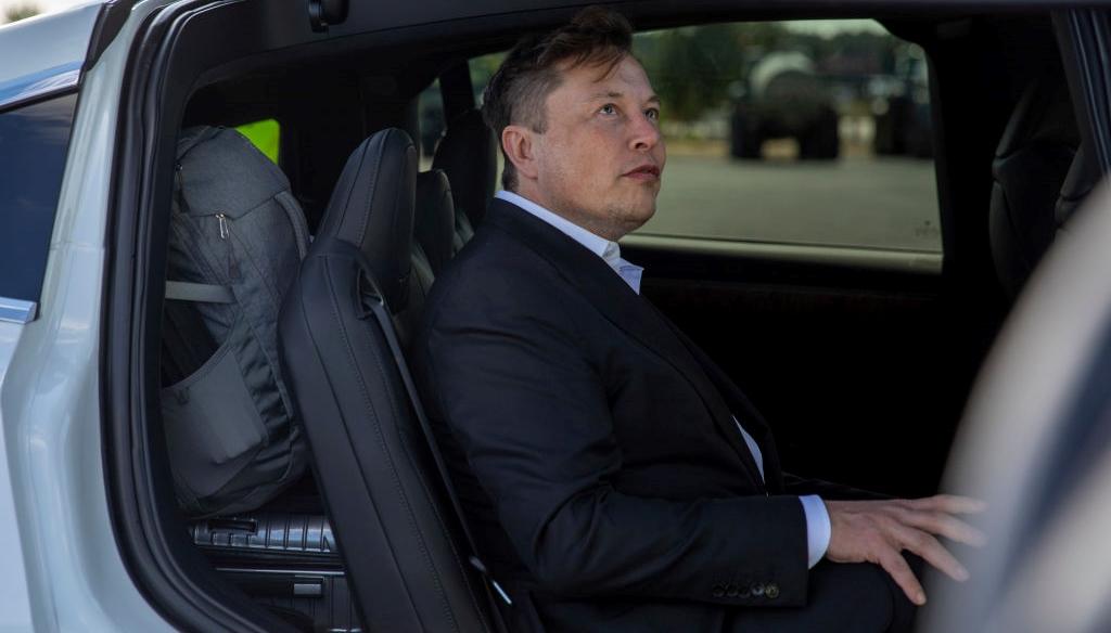 Elon Musk in Tesla vehicle