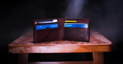 A wallet with credit cards in it
