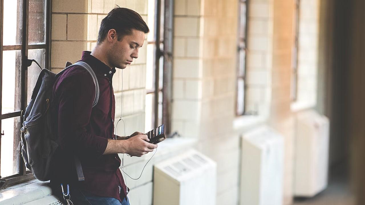 A student looking in his wallet