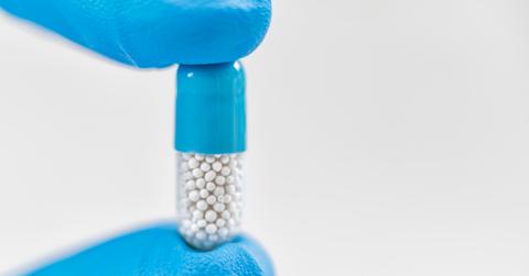 uploads///hand holding medicine