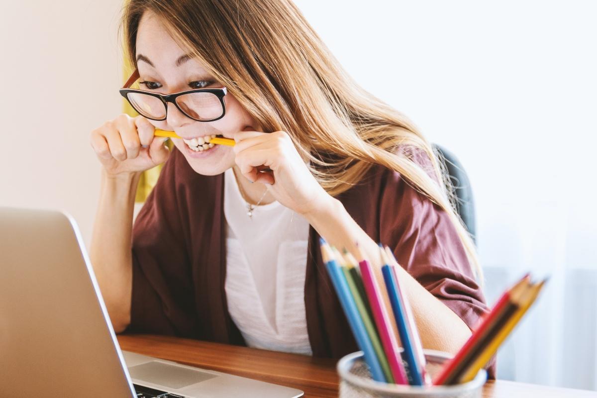 A woman calculating her finances