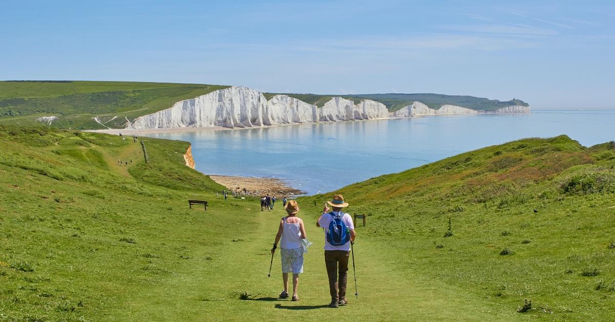 A couple enjoys a hike together. 