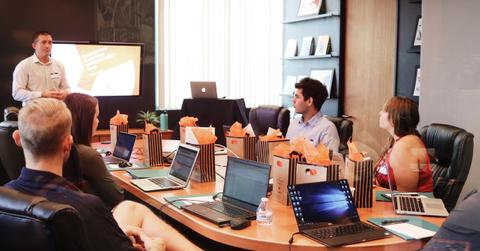 A company briefing finance interns