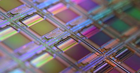 A microchip silicon wafer under a microscope