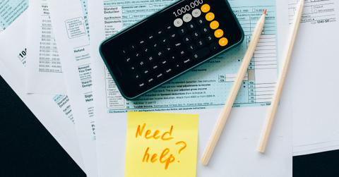 Income tax paperwork and a calculator