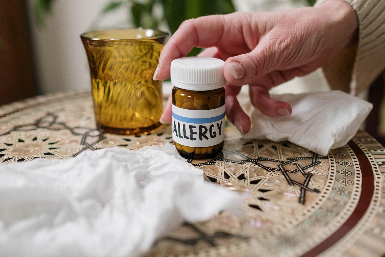 A pill bottle labeled as "Allergy"