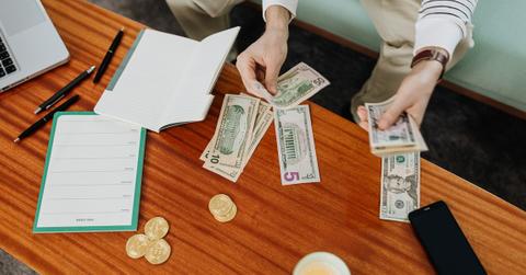 A person budgeting money