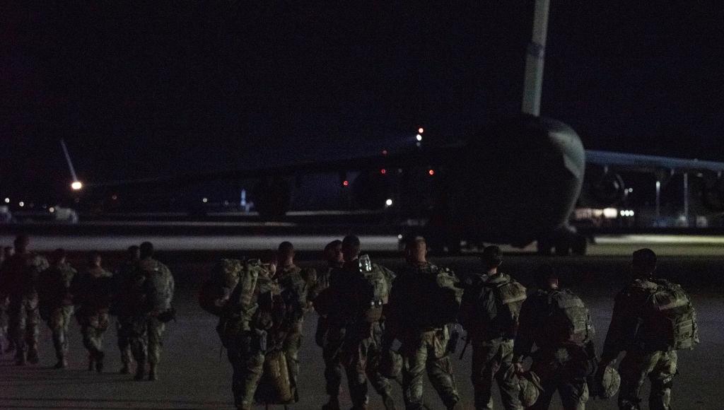 U.S. troops boarding a plane