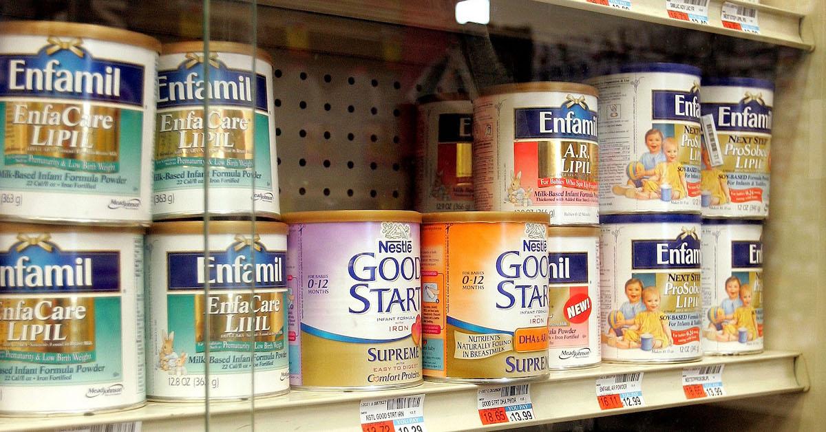 Baby formula brands on a shelf in a grocery store