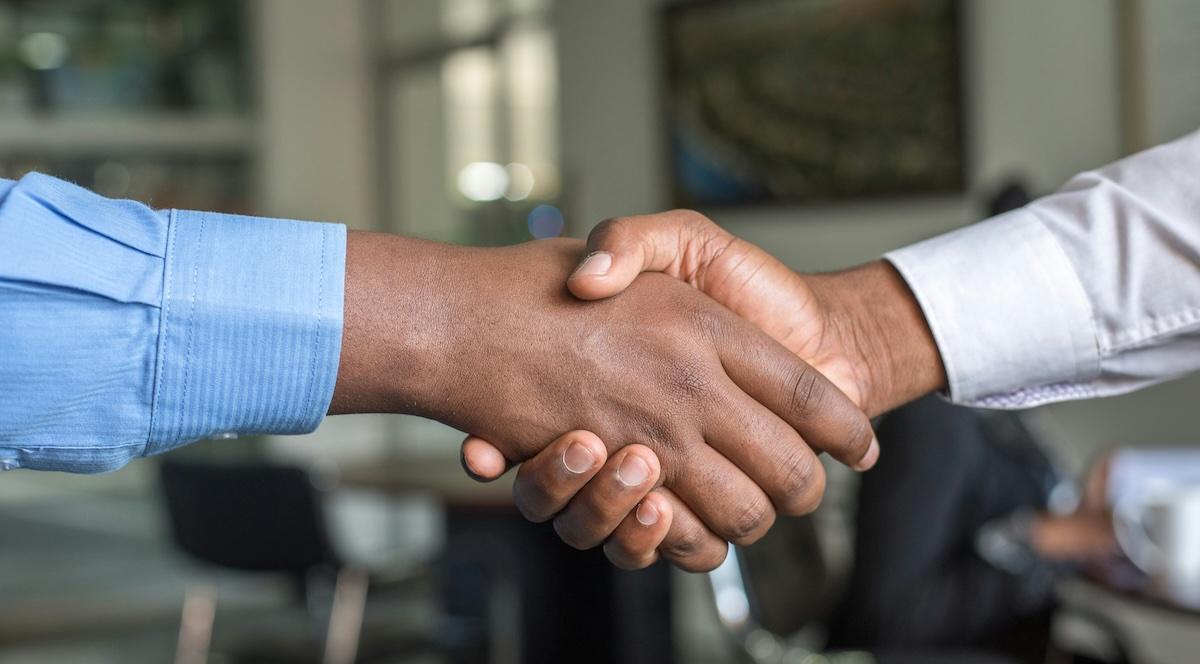 two men shaking hands