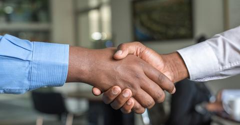 two men shaking hands
