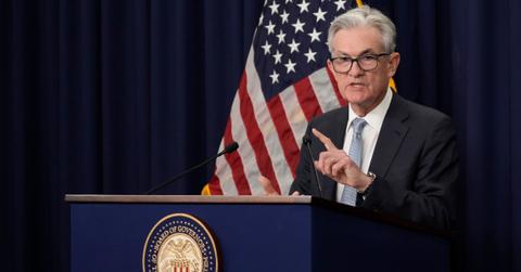 Fed Chair Jerome Powell announcing a 75 basis point rate hike