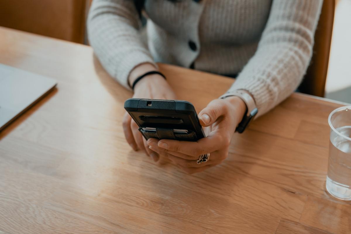 A woman using a mobile banking app