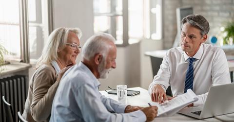 A couple signing their estate plan