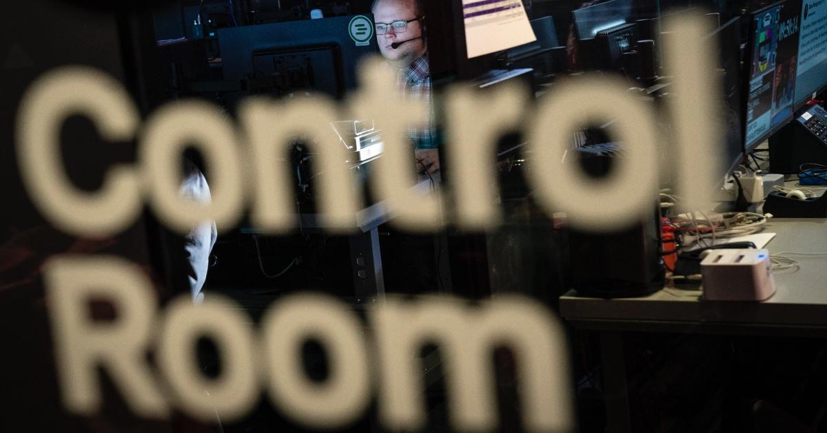 BuzzFeed News production team member works in the control room during recording of 'AM To DM' morning show.