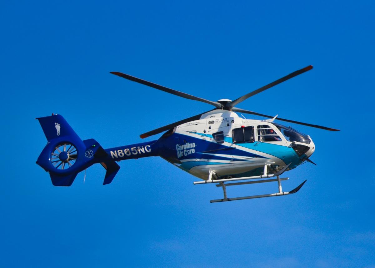 A blue and white medical helicopter