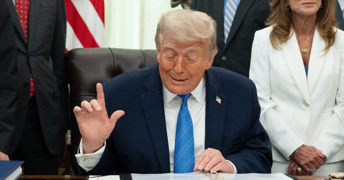 Donald Trump sitting in the Oval Office.