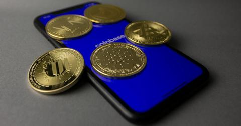 coins on top of a phone