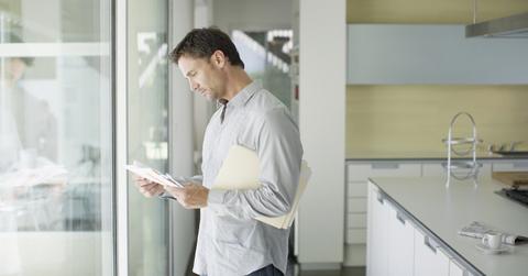 A man looking at medical bills