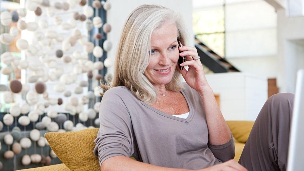 A woman talking on a phone