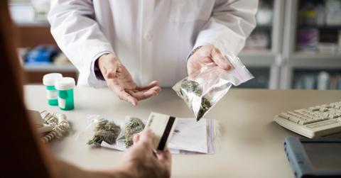 Person buying medical marijuana from a pharmacy