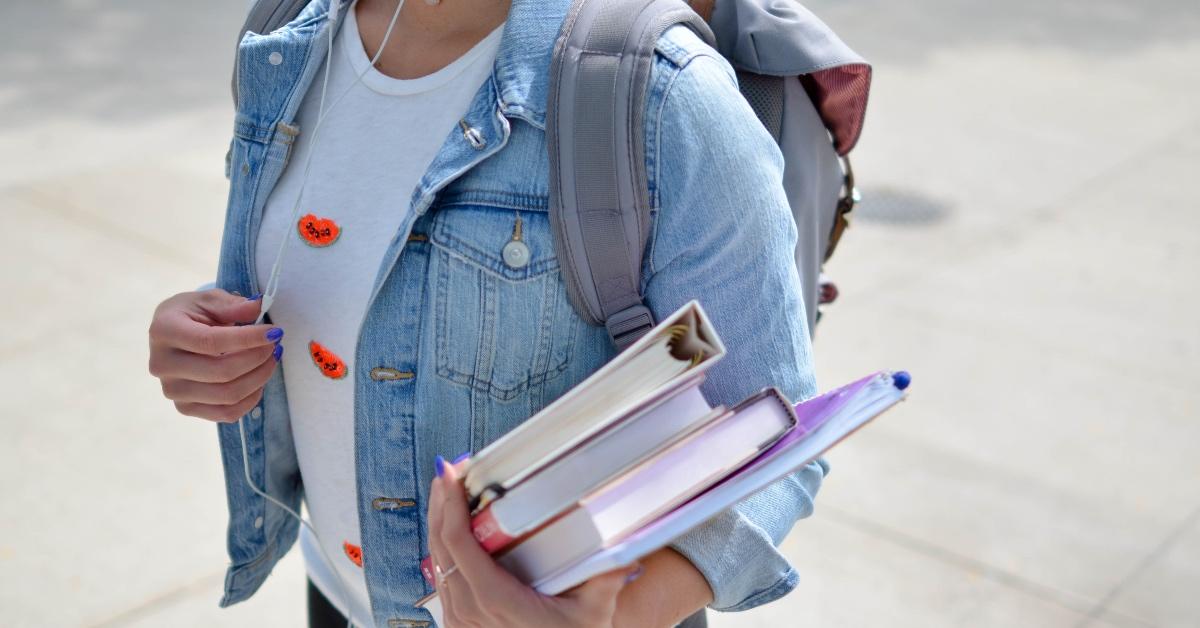 Girl carrying college books