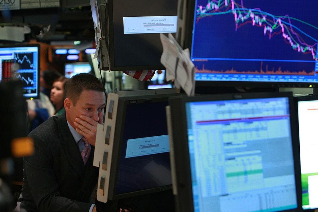  A trader works on the floor of the New York Stock Exchange