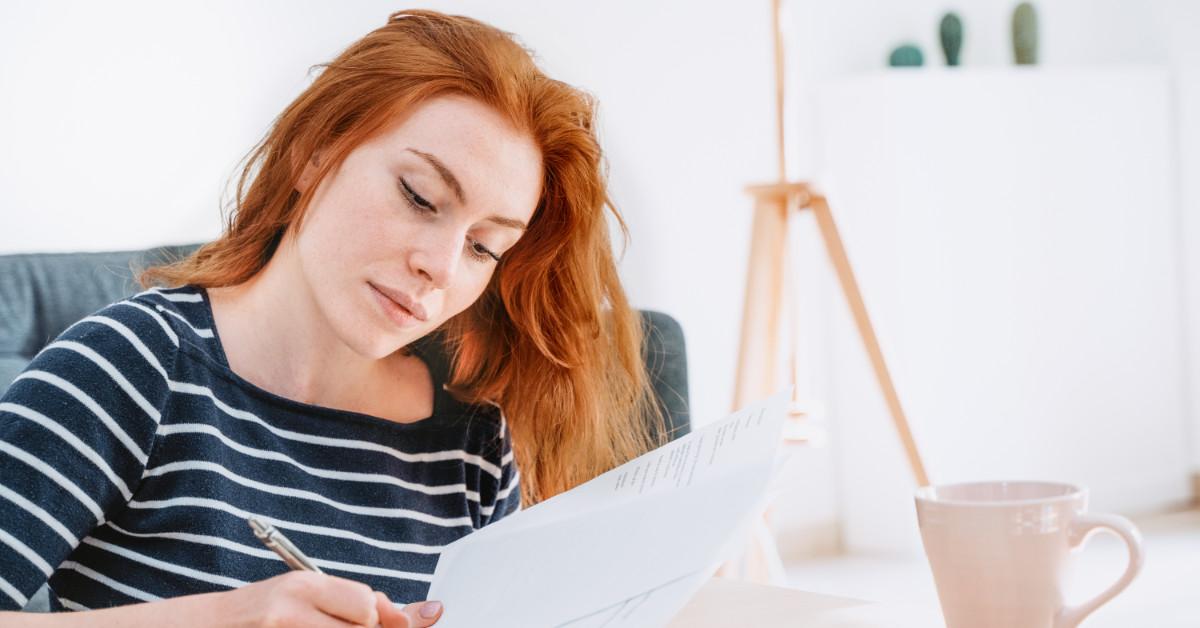 Woman looking at paperwork