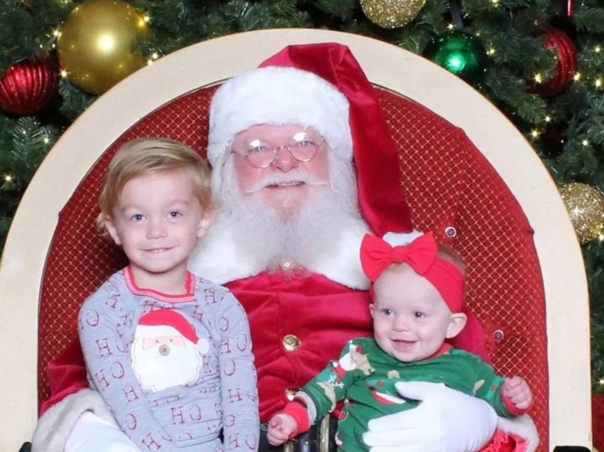 A mall Santa with two kids