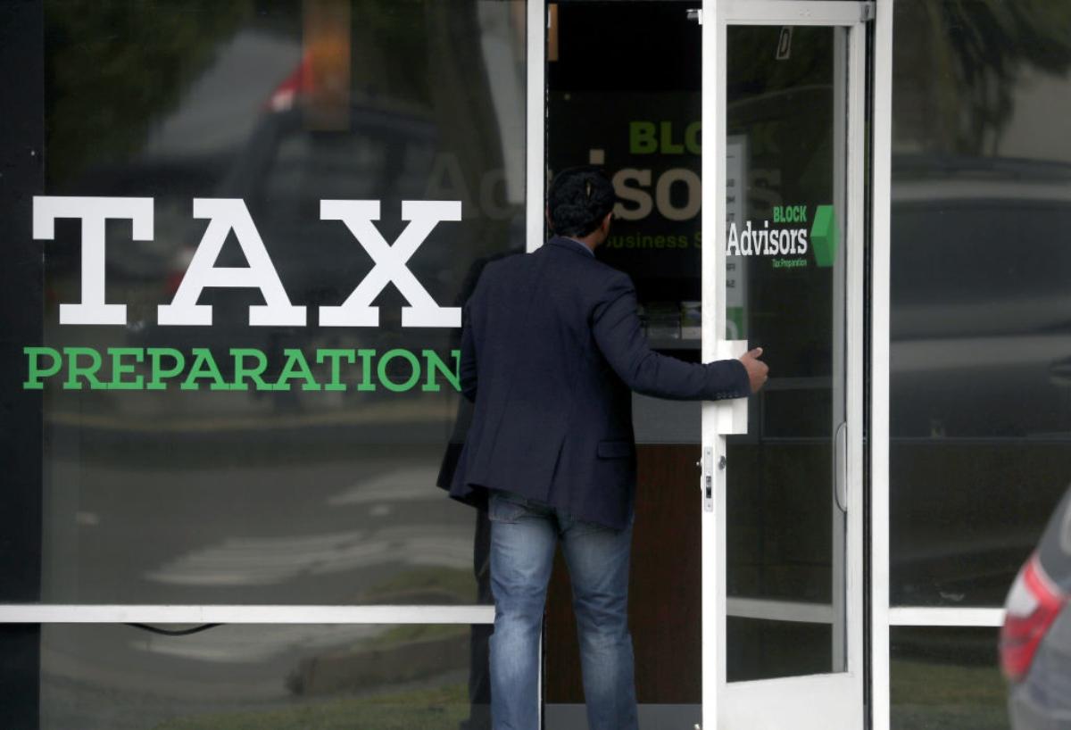 Man going into a tax preparation office