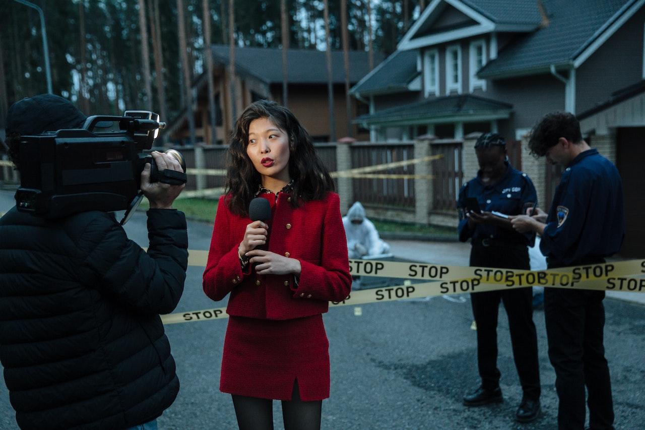 News reporter at a crime scene