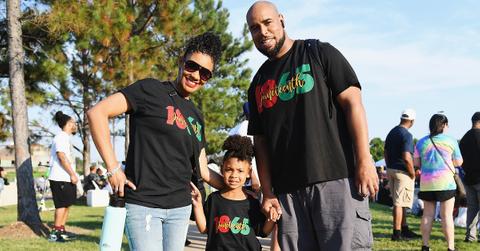 A family wearing t-shirt for Juneteenth