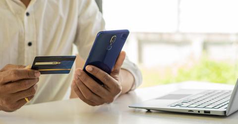 A person making a donation to a GoFundMe account