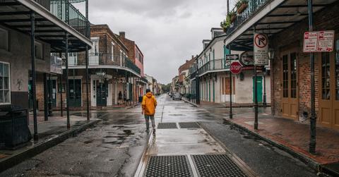 Man walking through the French Quarter before Hurricane Ida