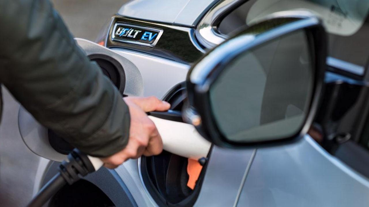 Man charging a Bolt EV