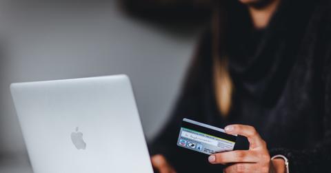 Woman making a purchase with a credit card