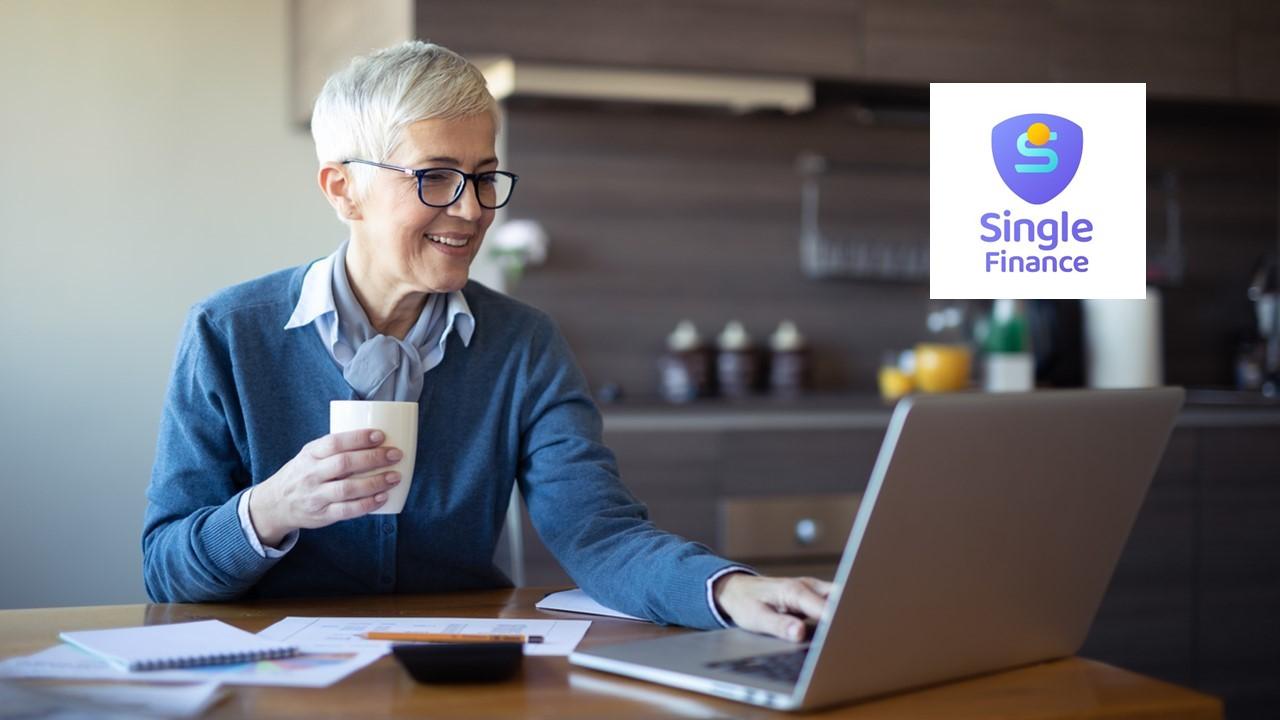 Woman using a laptop and Single Finance logo