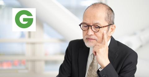 A man thinking about the Groupon logo