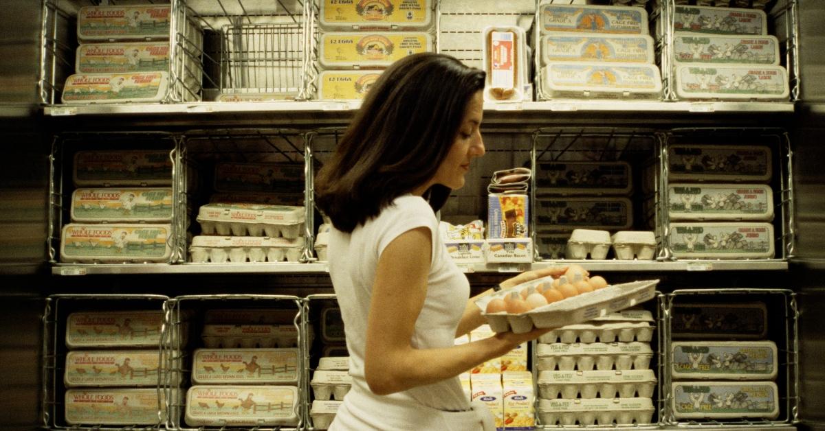 A woman buying eggs