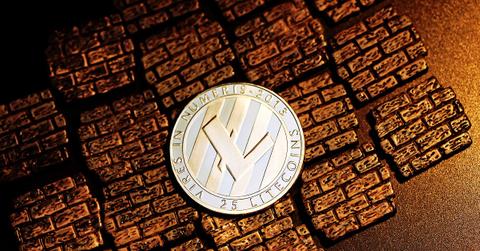A Litecoin is on a bricks