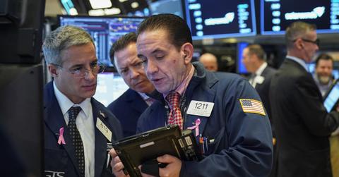 Stock traders discussing dividend stocks