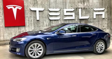 Tesla car and sign
