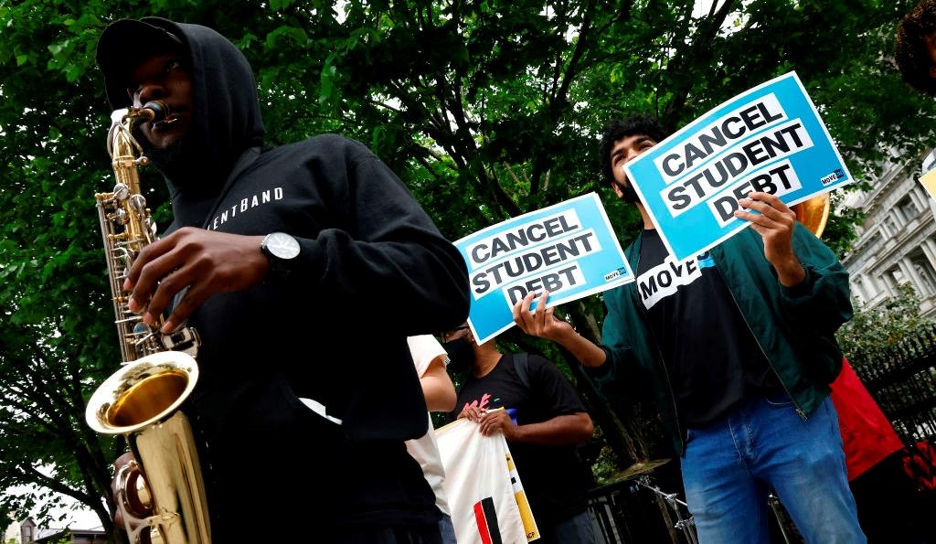 Cancel student debt signs at protest